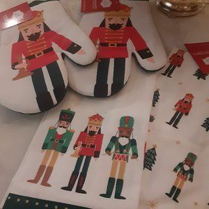 Nutcracker oven mitts and Dish towels